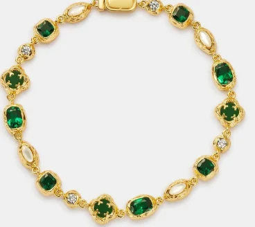 Gold bracelet with green gemstones and pearl accents